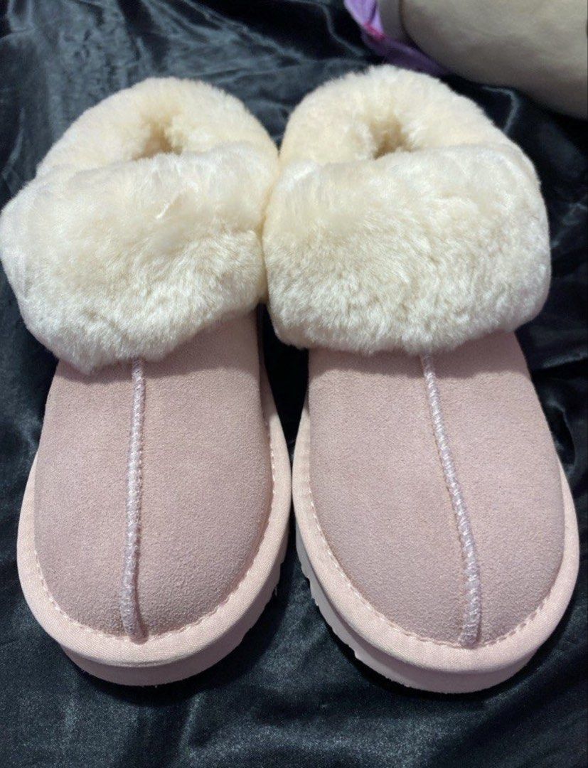 AUTHENTIC UGGS pink fux fur boots (Category: Slippers and slides) located in Makati City. Submitted by cosmic_nevada (Listing ID 1434800172, Image 2). Description: with OG plastic NO BOX DIRECTLY FROM AUSTRALIA pink size-6.