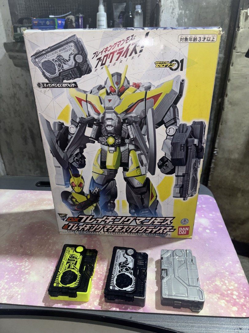 Bandai Kamen Rider Zero-One DX Breaking Mammoth Progress Key (Category: Action & Battle Toys) located in Bulacan. Submitted by cmesguerra1 (Listing ID 1434610068, Image 2). Description: - Bandai Kamen Rider Zero-One DX Breaking Mammoth Progress Key set. - Includes Breaking Mammoth Progress Key, figure, and accessories. - Figure can transform into robot and vehicle modes. - Box shows some wear and tear. - including kamen rider and extra progrise k