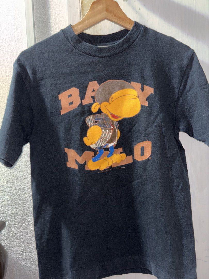 BAPE Baby Milo T-Shirt (Category: Tshirts & Polo Shirts ) located in Quezon City. Submitted by bigbert99 (Listing ID 1434681068, Image 1). Description: - Authentic BAPE Baby Milo T-shirt - Features Baby Milo graphic on front - BAPE logo on back - Made in Japan - Size: S - Color: 8.5/10 Issues check pics .