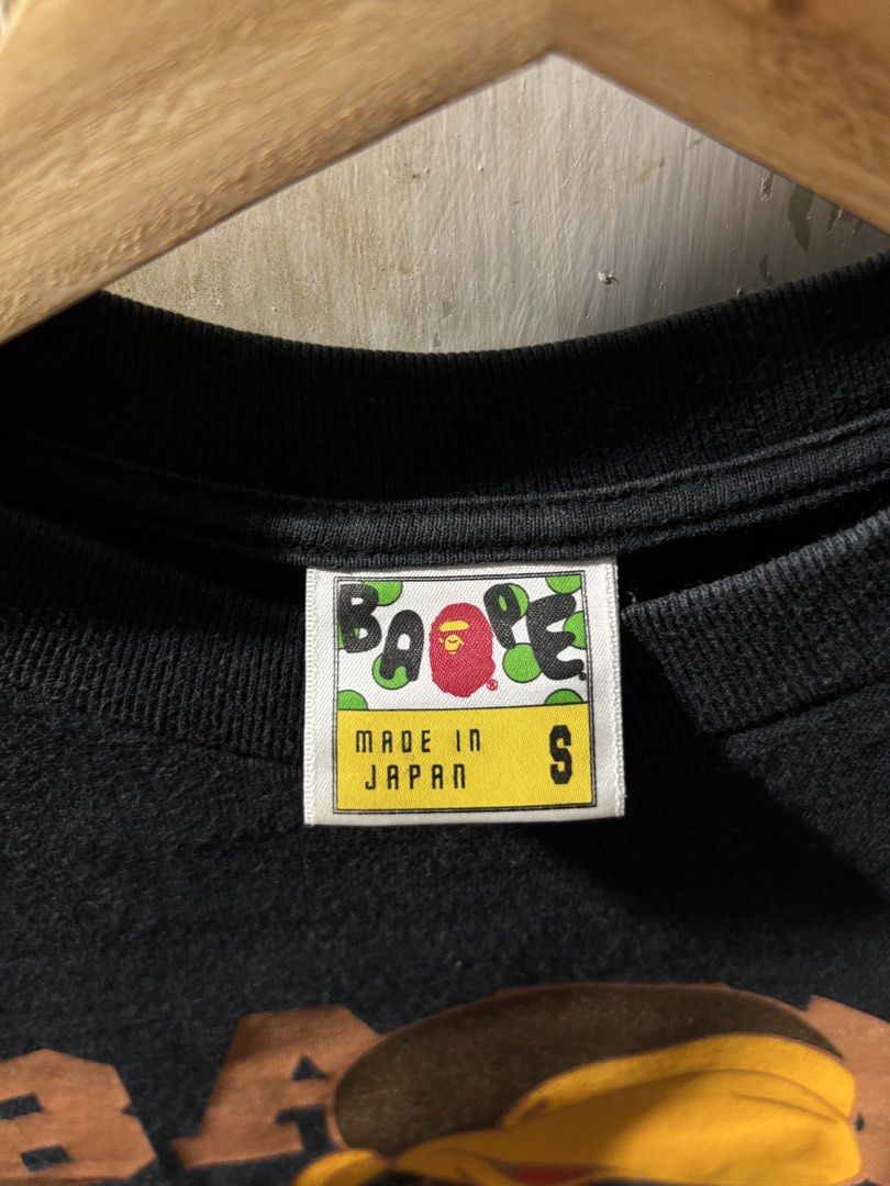 BAPE Baby Milo T-Shirt (Category: Tshirts & Polo Shirts ) located in Quezon City. Submitted by bigbert99 (Listing ID 1434681068, Image 3). Description: - Authentic BAPE Baby Milo T-shirt - Features Baby Milo graphic on front - BAPE logo on back - Made in Japan - Size: S - Color: 8.5/10 Issues check pics .