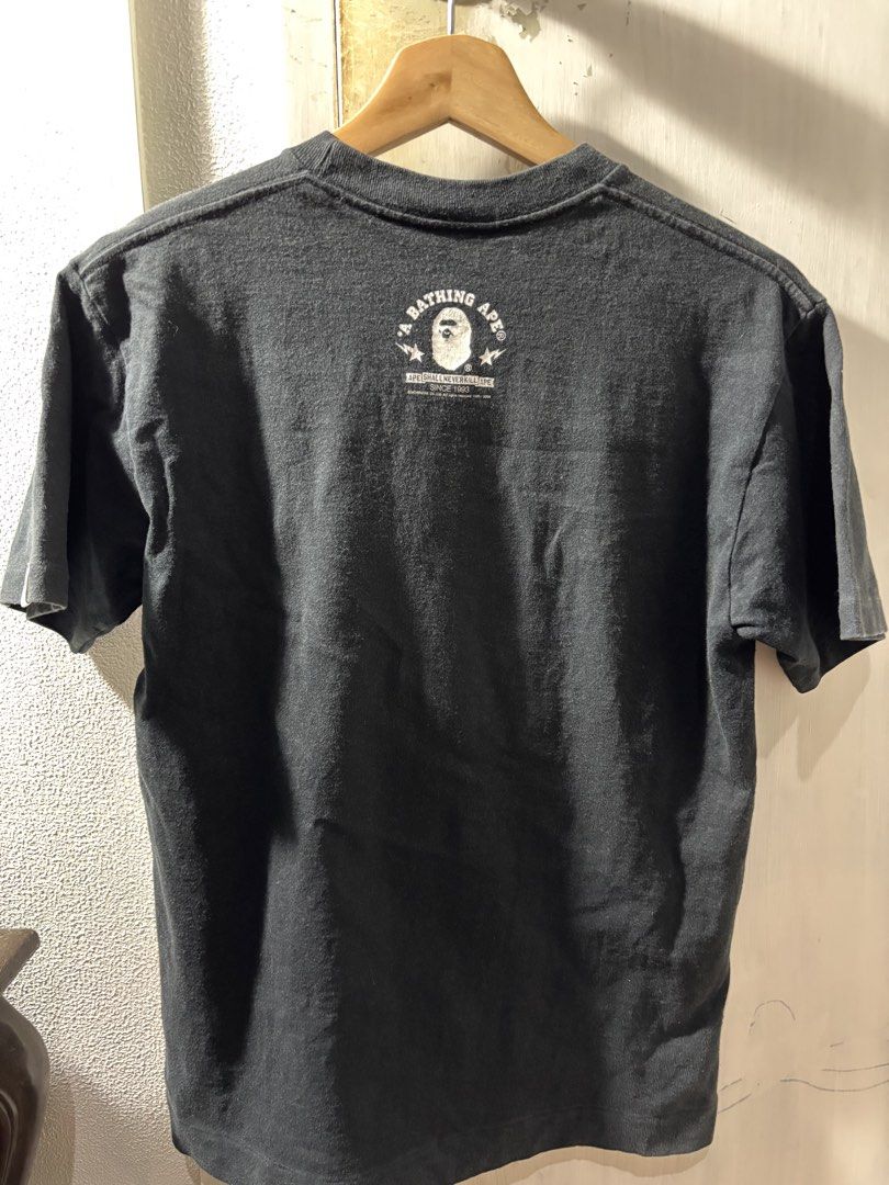 BAPE Baby Milo T-Shirt (Category: Tshirts & Polo Shirts ) located in Quezon City. Submitted by bigbert99 (Listing ID 1434681068, Image 2). Description: - Authentic BAPE Baby Milo T-shirt - Features Baby Milo graphic on front - BAPE logo on back - Made in Japan - Size: S - Color: 8.5/10 Issues check pics .