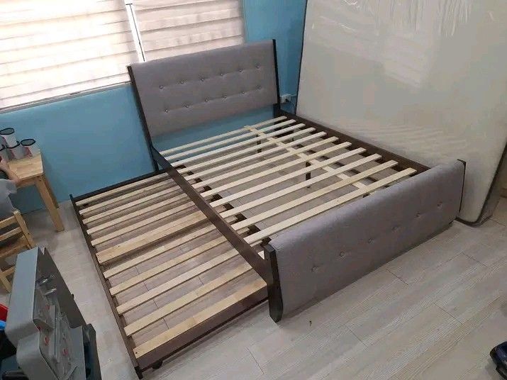 Bedframe with pull out bed frame (Category: Bed Frames & Mattresses) located in Manila. Submitted by j937122732511 (Listing ID 1434682220, Image 1). Description: Pm me or call 0 9 5 6 2 2 1 7 2 Free assemble then cash on delivery Delivery fee thru the lalamove rate We are located at Paco Manila .