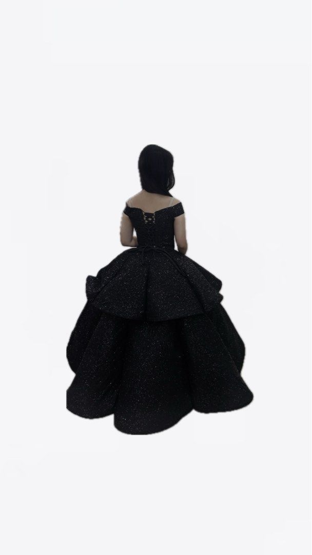 Black Off-Shoulder Evening Gown (Category: Evening dresses & gowns) located in Quezon City. Submitted by halfofit (Listing ID 1434707978, Image 2). Description: USED ONCE! - Elegant black evening gown - Off-shoulder design - Layered skirt - Fitted bodice - Lace-up back detail - Subtle sparkle fabric - Perfect for formal events and special occasions 2in 1 Gown. Convertible to cocktail gown. 6 hoop petticoat included Best fit small to medium frame.