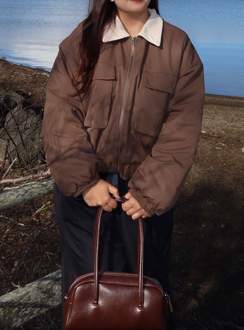SHEIN Brown Puffer Jacket with White Collar (Category: Coats, Jackets and Outerwear) located in Antipolo. Submitted by annedeclutterss (Listing ID 1434797534, Image 3). Description: - Brown puffer jacket - Cream collar - Zipper closure - Two front pockets - Oversized fit - Perfect for winter.