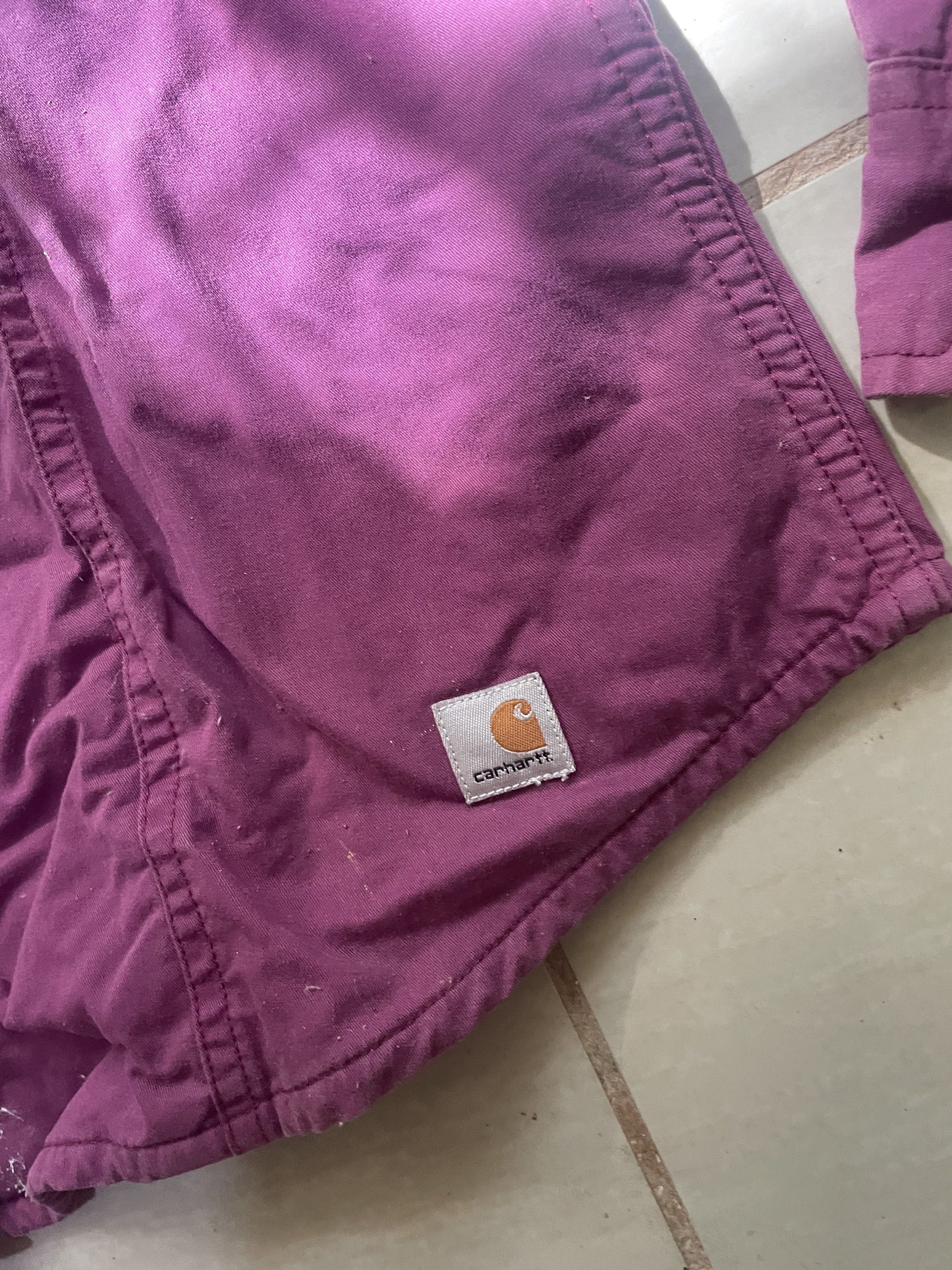 Carhartt For Women Shirt (Category: Shirts) located in Santa Barbara. Submitted by frryt (Listing ID 1434603292, Image 2). Description: - Carhartt women's button-down shirt - Features two chest pockets - Stylish plaid lining on collar and inside - Deep purple color - Size: Medium - Made in Bangladesh.