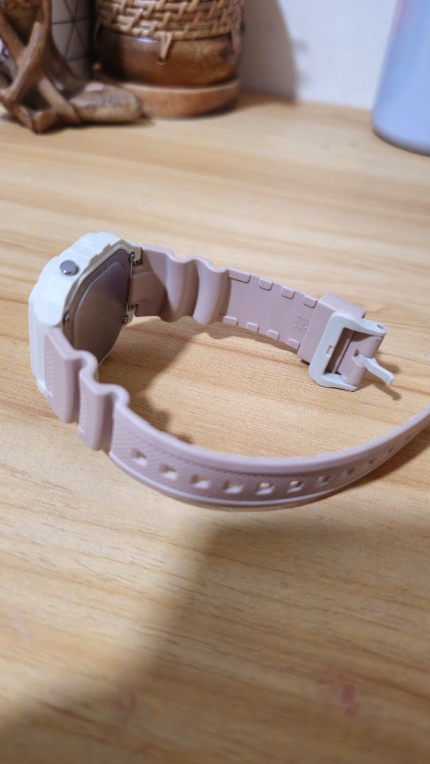 Casio Digital Watch Illuminator - Pink (Category: Men's Watches) located in Rosario. Submitted by prelovedbyengineertoni (Listing ID 1434733419, Image 2). Description: - Casio digital watch - White and pink color scheme - Square digital display - Pink watch band - Side buttons and buckle closure - Displays time - Suitable for everyday use.