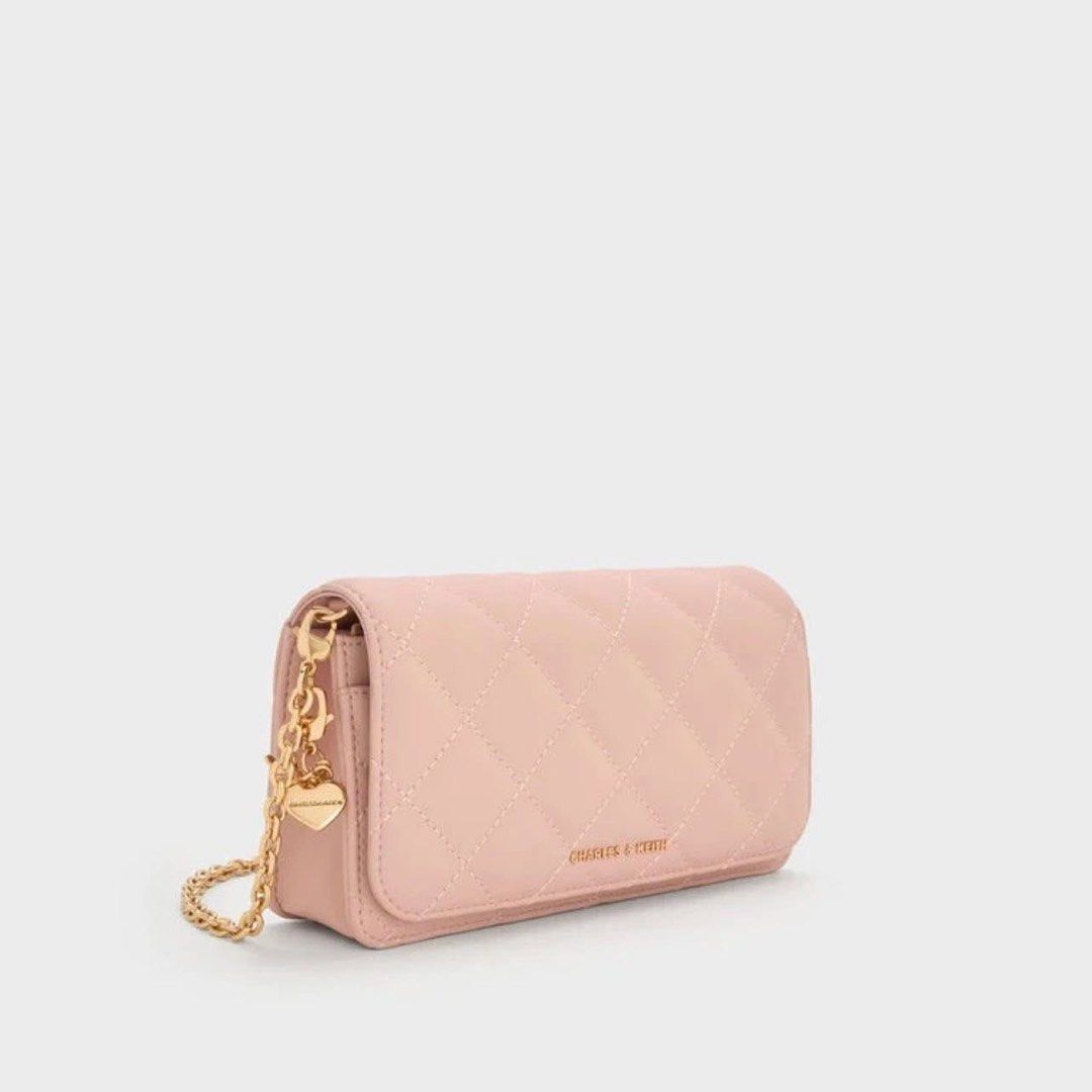 Charles & Keith Quilted Wallet with Chain Sling (Category: Wallets & Card holders) located in Pasig City. Submitted by ff.ph (Listing ID 1434651035, Image 2). Description: Sling Wallet With Box Color Pink With card Slots Add paperbag plus 80.