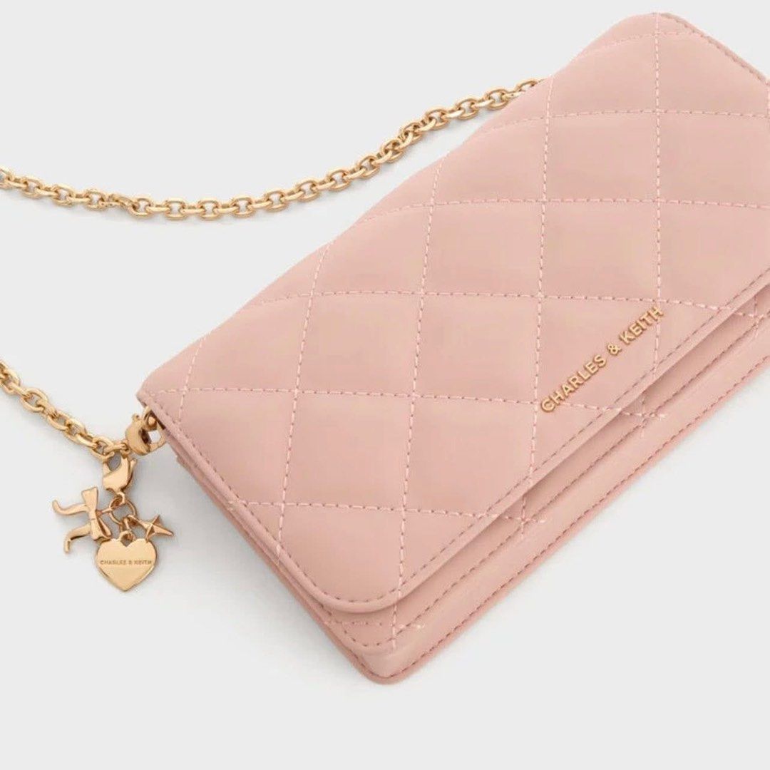 Charles & Keith Quilted Wallet with Chain Sling (Category: Wallets & Card holders) located in Pasig City. Submitted by ff.ph (Listing ID 1434651035, Image 3). Description: Sling Wallet With Box Color Pink With card Slots Add paperbag plus 80.
