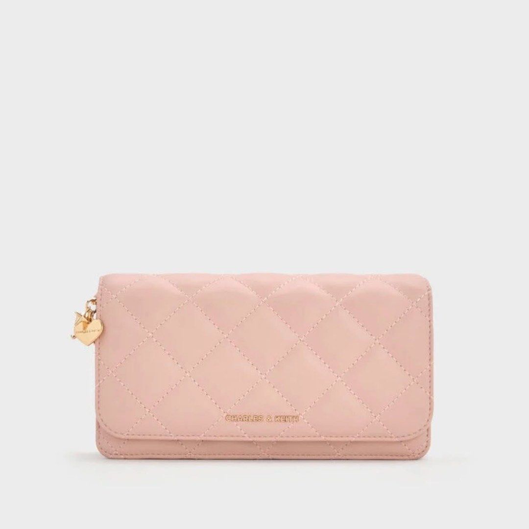 Charles & Keith Quilted Wallet with Chain Sling (Category: Wallets & Card holders) located in Pasig City. Submitted by ff.ph (Listing ID 1434651035, Image 1). Description: Sling Wallet With Box Color Pink With card Slots Add paperbag plus 80.