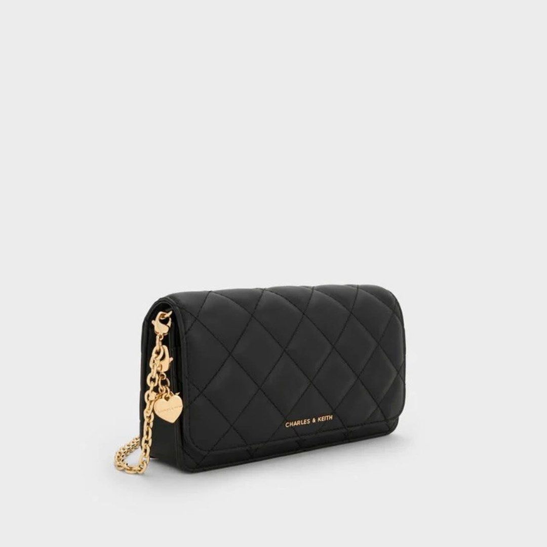 Charles & Keith Quilted Wallet With Chain Sling (Category: Wallets & Card holders) located in Pasig City. Submitted by ff.ph (Listing ID 1434651750, Image 2). Description: Sling Wallet With Box With Card slots With zipper compartment Color Black Add paperbag plus 80.