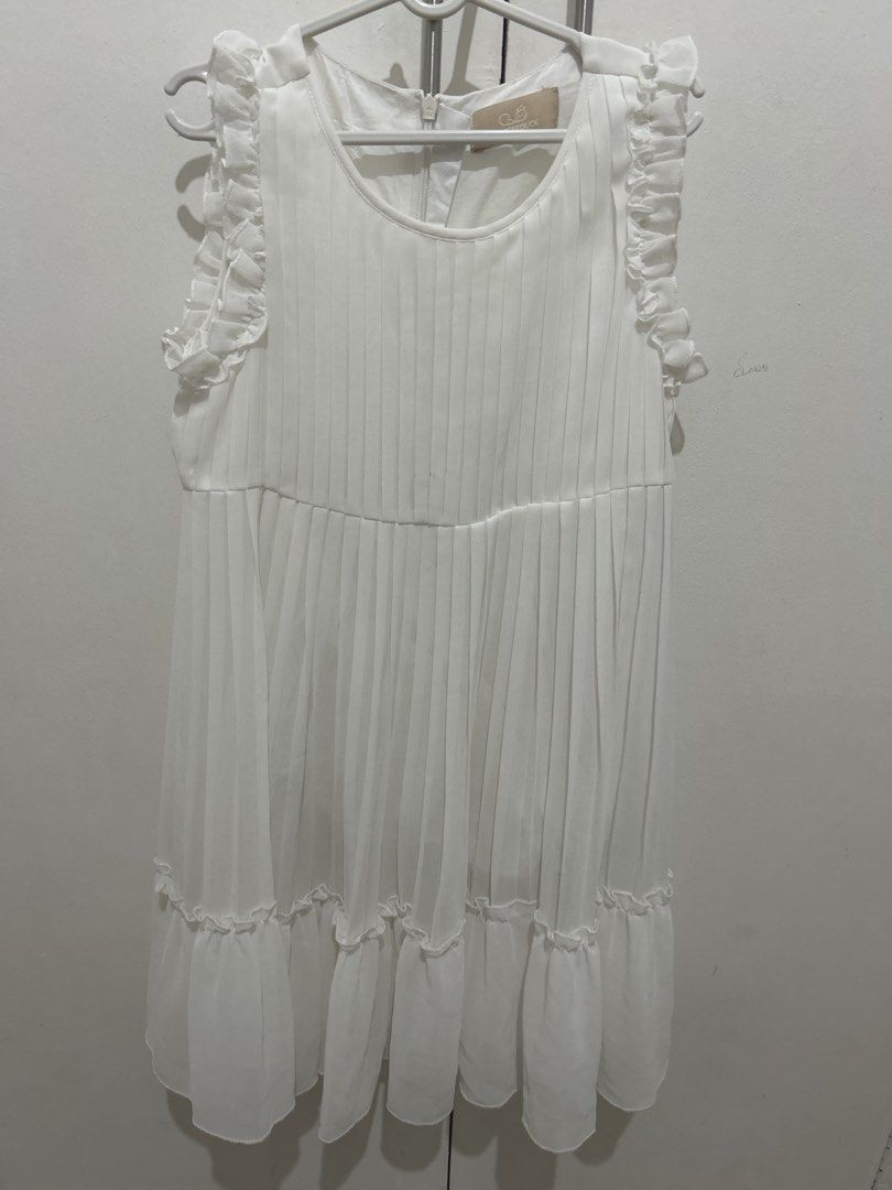 Chic Kee Duck White Pleated Dress (Category: Babies & Kids Fashion) located in Manila. Submitted by primemover2 (Listing ID 1434706582, Image 1). Description: - Chic Kee Duck white dress - Pleated design - Ruffle details on sleeves and hem - Round neckline - Zipper closure at the back - Lightweight fabric - Suitable for warm weather - Great for casual or special occasions.