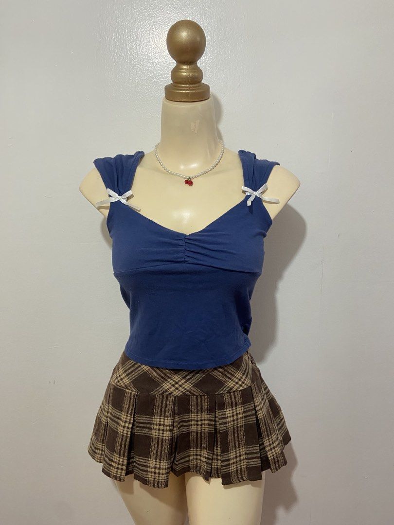 Coquette Navy Blue Top (Category: Sleeveless) located in Mandaluyong City. Submitted by cxia_style (Listing ID 1434778572, Image 1). Description: Top Only‼️ ♡ washed & ready-to-wear ♡ all items are handpicked ♡ nationwide shipping ♡ see each photo for more details. DM us for more info 💌.