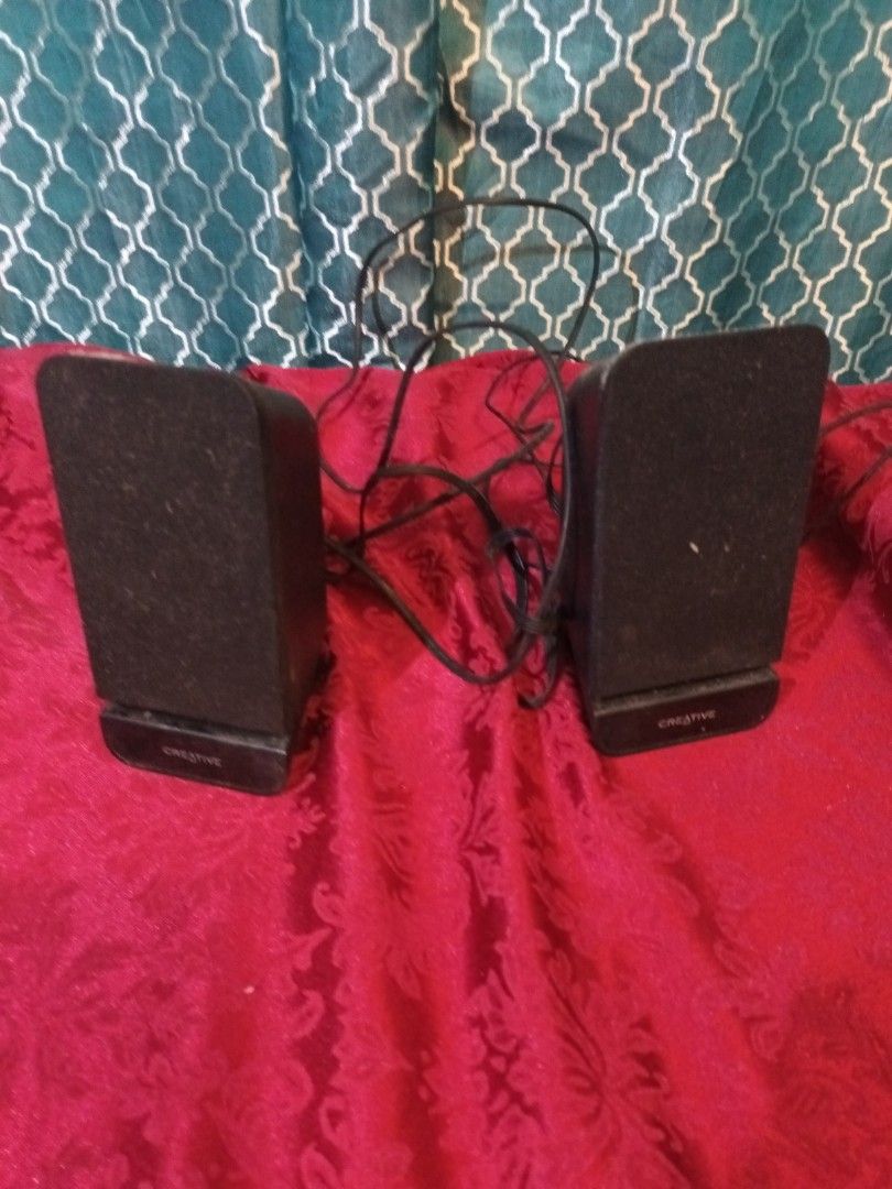 Creative A60 Speakers (Not Tested) (Category: Soundbars, Speakers & Amplifiers) located in Makati City. Submitted by epic_prelovedmakati (Listing ID 1434629498, Image 1). Description: - Creative A60 speakers - Sleek black design - Includes two speakers - Comes with connecting wires - Rectangular shape with mesh front - Designed for flat surfaces.