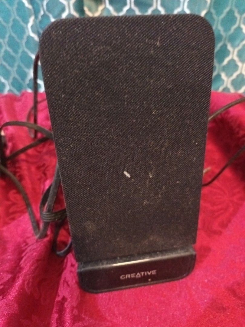 Creative A60 Speakers (Not Tested) (Category: Soundbars, Speakers & Amplifiers) located in Makati City. Submitted by epic_prelovedmakati (Listing ID 1434629498, Image 2). Description: - Creative A60 speakers - Sleek black design - Includes two speakers - Comes with connecting wires - Rectangular shape with mesh front - Designed for flat surfaces.