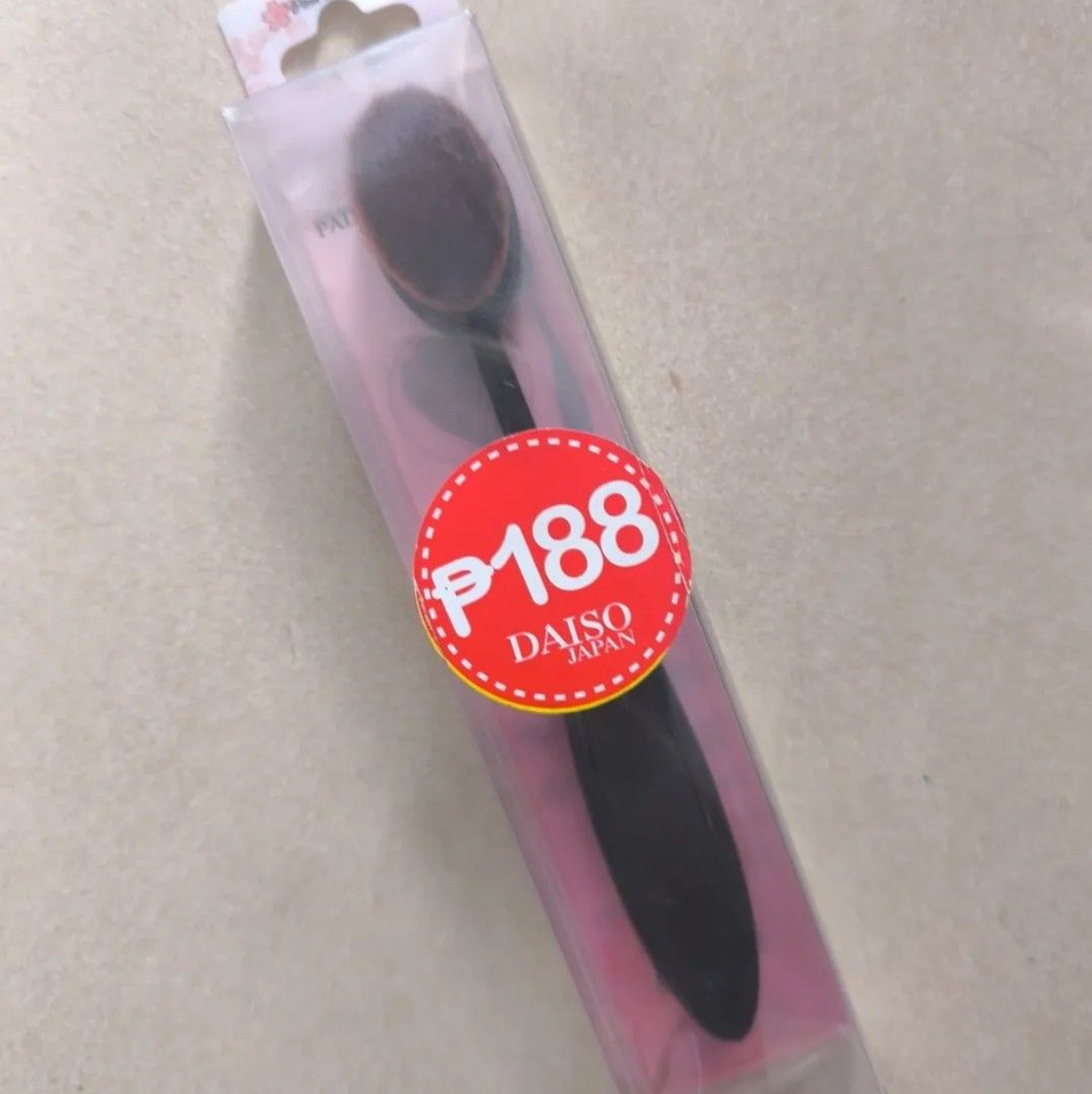 Daiso Japan Oval Makeup Paddle Brush (Category: Makeup) located in Manila. Submitted by lianlim.mail (Listing ID 1434682156, Image 1). Description: - Daiso Japan Oval Makeup Paddle Brush - Brand new, but original packaging not perfect. - Price tag: ₱188 - Dark brown oval brush head - Unused.