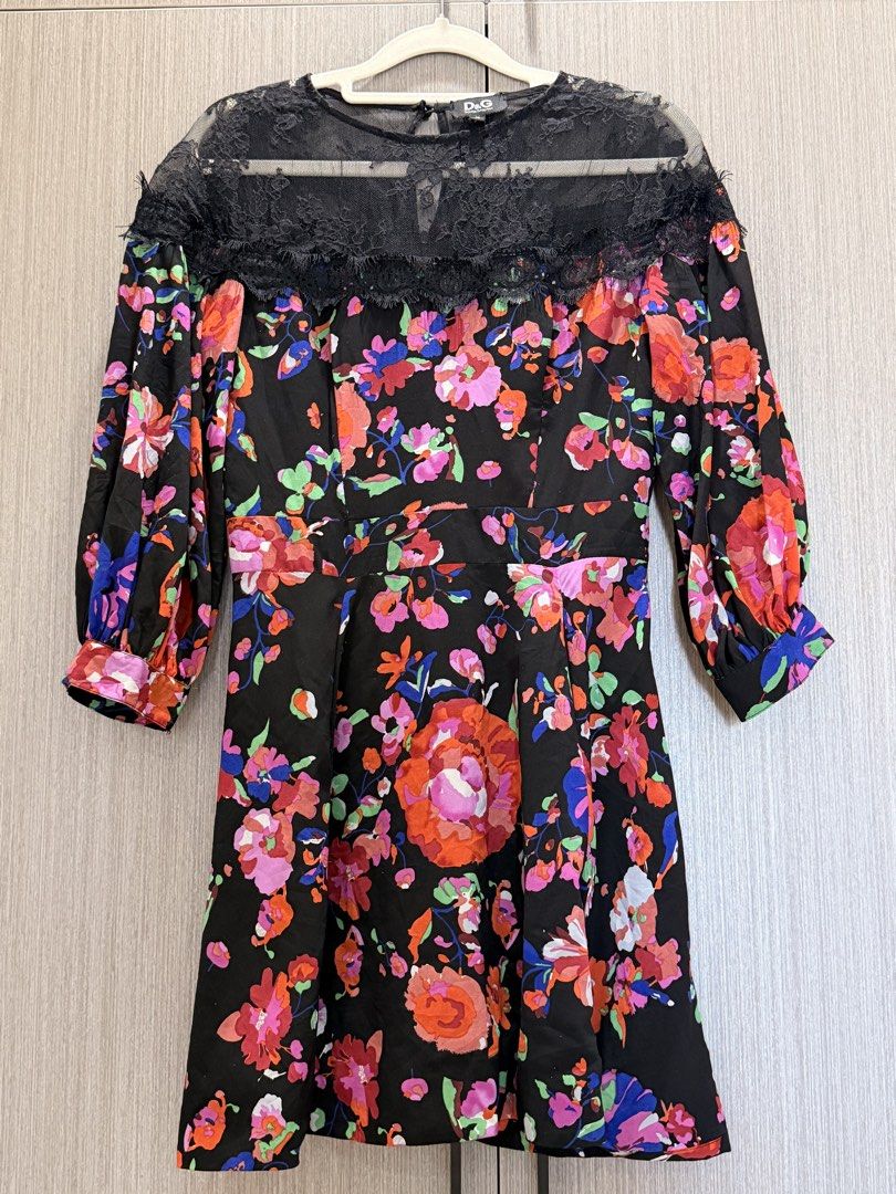 D&G Floral Dress (Category: Luxury Apparel) located in Pasay City. Submitted by wuangel_ (Listing ID 1434628999, Image 2). Description: black dress with a floral pattern and lace detailing, styled to brand-name fashion apparel DOLCE & GABANNA Back zipper with buttons Flowy .
