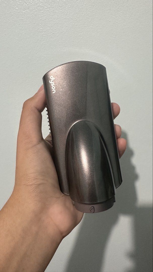 Dyson Airwrap Firm Smoothing Brush Attachment (Category: Hair) located in Urdaneta. Submitted by oc_decluttering (Listing ID 1434757509, Image 2). Description: For Sale Dyson Firm Smoothing Brush for Dyson Airwrap Multi-Styler (Fuschia/Nickel) RFS : not using this attachment Selling Price : 2,500 (negotiable) Original Dyson Like new Used once or twice for trial No damage Preferably Pick-up or Meet-up at Urdaneta City, Pangasinan For shipping, buy