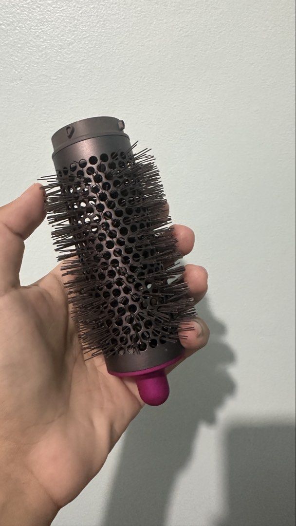 Dyson Round Volumizing Brush (Category: Hair) located in Urdaneta. Submitted by oc_decluttering (Listing ID 1434756529, Image 2). Description: For Sale Dyson Round Volumizing Brush for Dyson Airwrap Multi-Styler (Fuschia/Nickel) RFS : not using this attachment Selling Price : 2,500 (negotiable) Original Dyson Like new Used once or twice for trial No damage Preferably Pick-up or Meet-up at Urdaneta City, Pangasinan For shipping, buyer to shoulder 