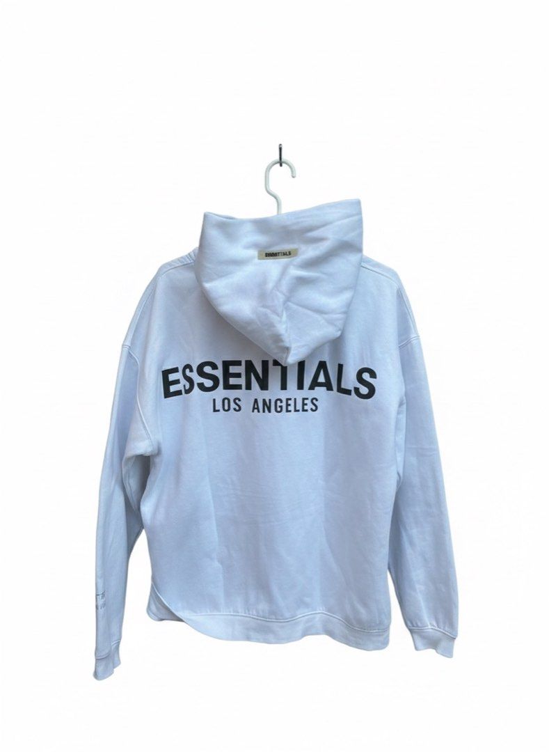 Essentials fear of God Los Angeles Hoodie (Category: Hoodies) located in Manila. Submitted by rl4lifeee (Listing ID 1434694384, Image 1). Description: 1999 FREE SHIPPING Large size - White Essentials hoodie - "Essentials Los Angeles" print on the back - Essentials logo on the hood - Relaxed fit - Long sleeves - Hooded.