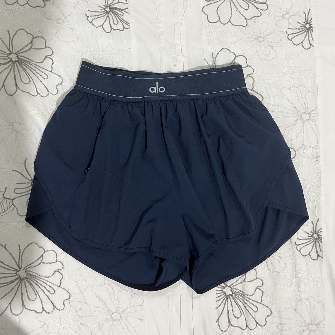 Extra Small | Alo Yoga Match Point Shorts Navy (Category: Activewear) located in San Juan City. Submitted by sunnycycle (Listing ID 1434783724, Image 1). Description: Size: Extra Small Color: Navy Condition: 7/10 Note/s: band has a small flaw, not noticeable when worn cos it stretches out. Please see last photo Perfect for tennis, golf, pickleball, or athleisure looks. Lightweight, sweat-wicking fabric, high-waist fit. Helping tags: Adidas Nike L