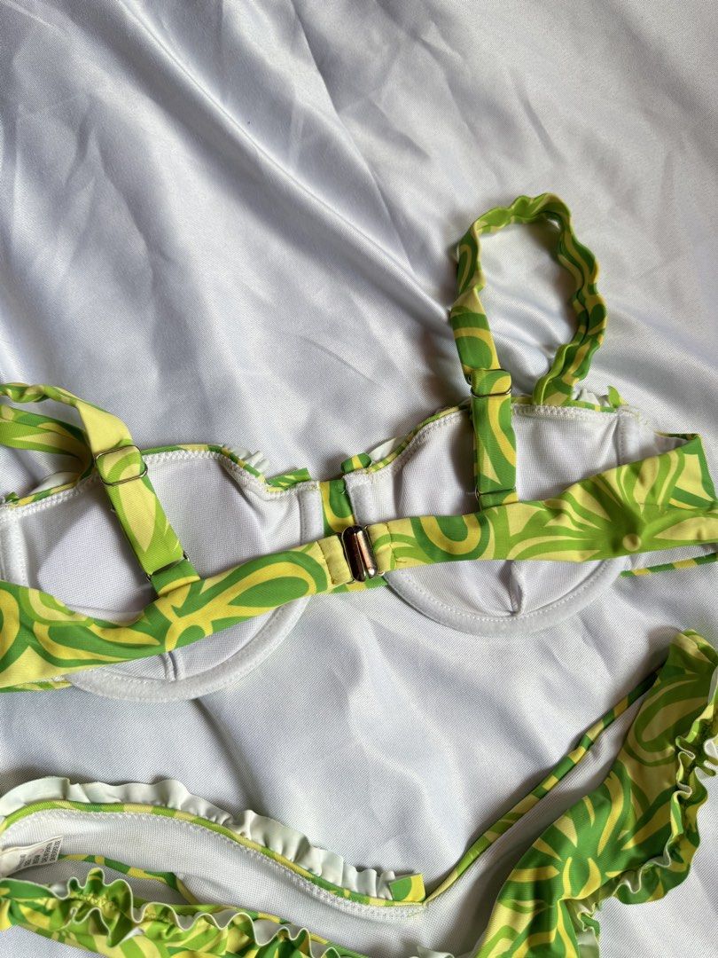 Floral Print Underwire Green Bikini Set (unused) (Category: Bikinis & Swimsuits) located in Paranaque City. Submitted by maedizon (Listing ID 1434653193, Image 2). Description: - NEVER WORN - Brand new floral bikini set (padded) - Vibrant green and yellow print - Underwire top with adjustable straps - Matching low-waist bottom - Ruffle detailing on the bottom - Ideal for beach trips and poolside relaxation -very kendall jenner bikini sya -Xs-s.