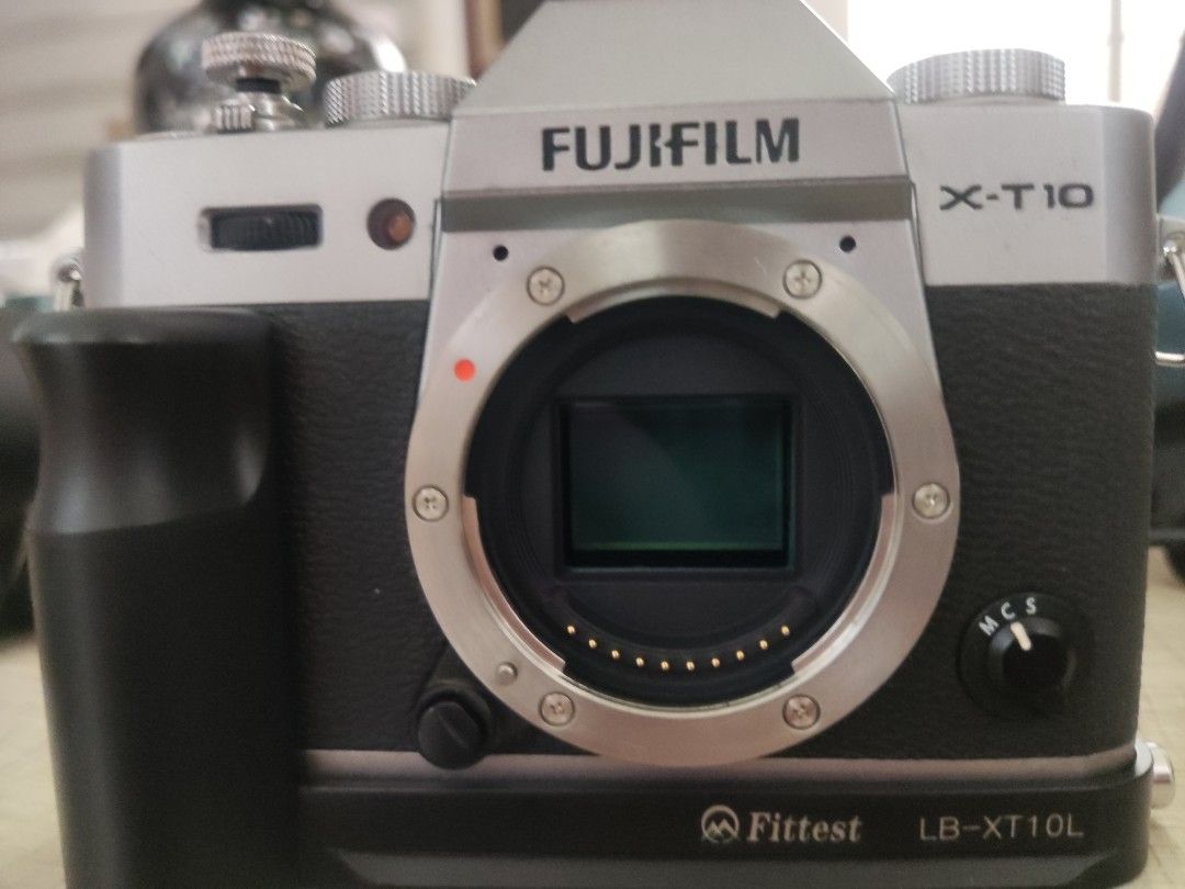 Fujifilm X-T10 Mirrorless Camera with Lens (Category: Cameras) located in Manila. Submitted by davidsgoodbuys (Listing ID 1434668917, Image 3). Description: Selling my Fujifilm X-T10 RFS: planning to upgrade my camera collection further - Includes Fujinon Super EBC XF 18-55mm f/2.8-4 R LM OIS lens - Silver and black body - Fittest LB-XT10L grip included - Built-in flash - Rear LCD screen - Features various buttons and dials for settings comes as 