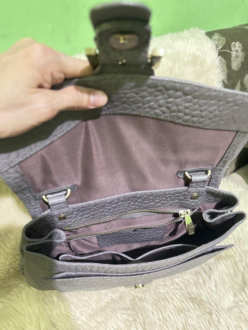 GEORGES RECH CROC LEATHER BAG (Category: Luxury Bags & Wallets) located in Angeles City. Submitted by chicprelovedstuffs.owl (Listing ID 1434679178, Image 3). Description: FREE SHIPPING‼️‼️ Preloved Bag‼️ MINE now, ship the next day‼️ RFS: Decluttering / No space for new bags - Gray Croc leather handbag w/ sling strap - Flap closure with gold-tone buckle - Top handle and detachable shoulder strap - Interior: zippered pocket and multiple compartme