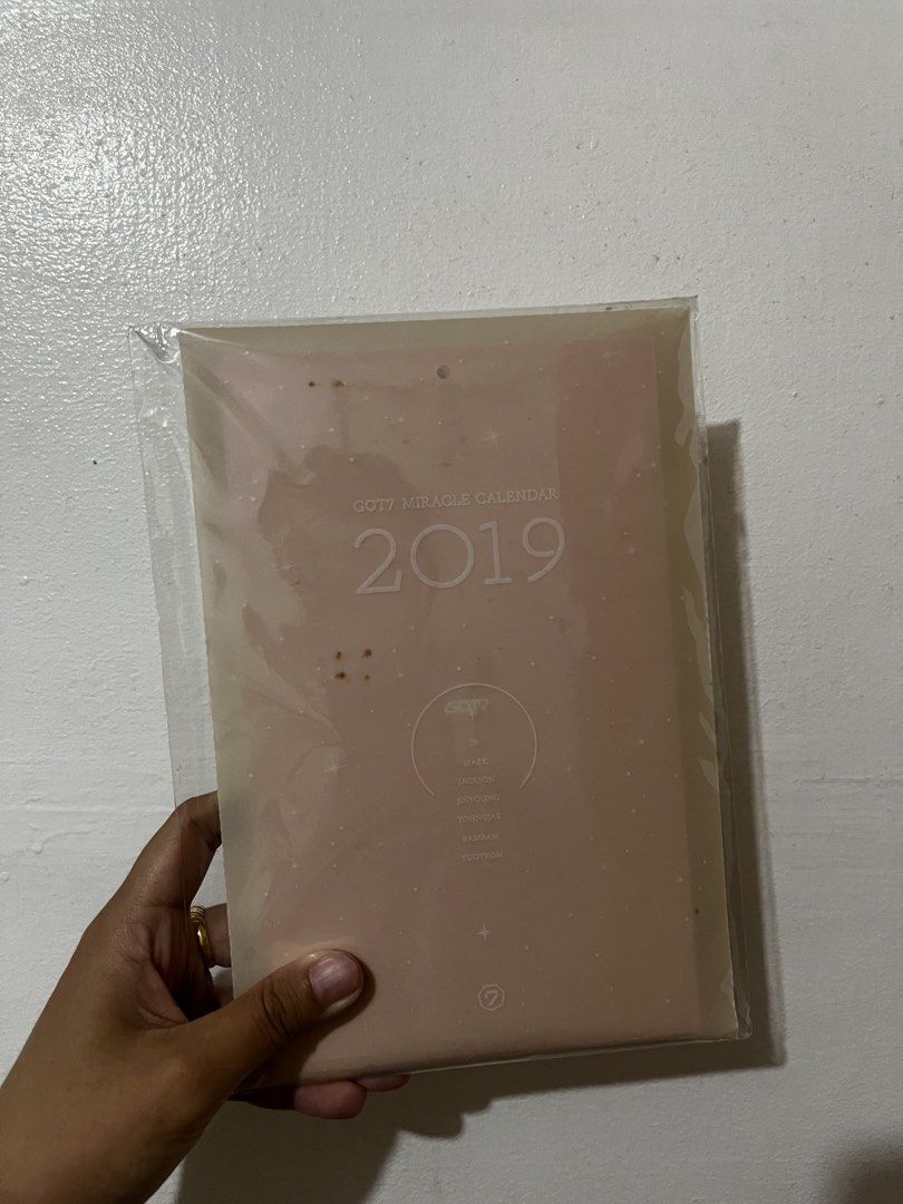 GOT7 Miracle Calendar 2019 (Category: Magazines) located in Manila. Submitted by margauxxxxx (Listing ID 1434747084, Image 1). Description: - GOT7 Miracle Calendar from 2019 - Still sealed in original plastic - Light pink front cover - Features the year 2019 - Back cover has GOT7 logo sticker - Includes the words "Present: YOU & ME".