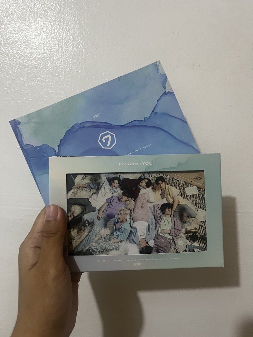 GOT7 Present: YOU Album photocard set (Category: K-Wave Merchandise) located in Manila. Submitted by margauxxxxx (Listing ID 1434747254, Image 1). Description: - GOT7 Present: YOU album - Includes album packaging - Features a blue envelope - Contains a photo of the group - Album is in a rectangular box with a light blue frame - Features the GOT7 logo on the cover.