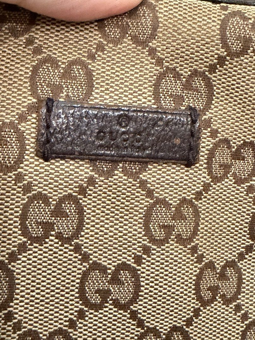 Gucci GG Canvas Crossbody Bag (Category: Luxury Bags & Wallets) located in Las Pinas. Submitted by Dear_Karmen (Listing ID 1434617384, Image 3). Description: - Authentic Gucci shoulder bag - Iconic GG canvas design - Green and red stripe strap with signs of usage but still in good condition. location: las piñas.