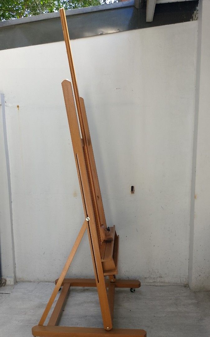 H-Frame Studio Easel Stand Heavy duty (Category: Art & Prints) located in San Pedro. Submitted by megoy12 (Listing ID 1434645326, Image 3). Description: Studio Easel Stand heavy duty Dimensions: Height : 98" Width : 30" Base Depth : 34" Base Width :32.5" Can Hold Up to 70" of Canvas Board Maple finished Fully Adjustable Weight: 18.5 kg more or less Price :10,500 .
