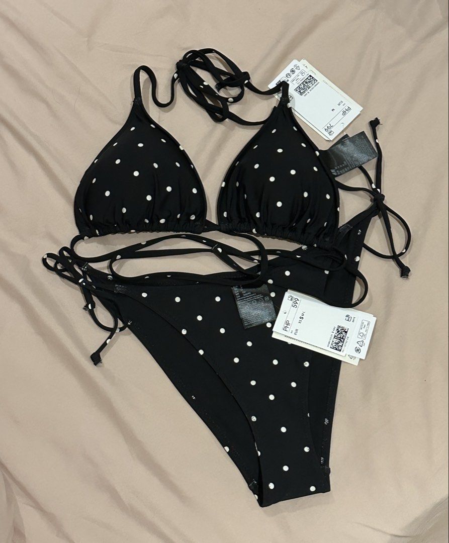 H&M Black Polka Dot Bikini Swimsuit Set (Category: Bikinis & Swimsuits) located in Santa Rosa. Submitted by aikcat (Listing ID 1434787205, Image 1). Description: - Black bikini set - White polka dot design - Triangle top with tie straps - Matching self tie bottom - Size: Top-M Bottom-S - Brand new with tag.