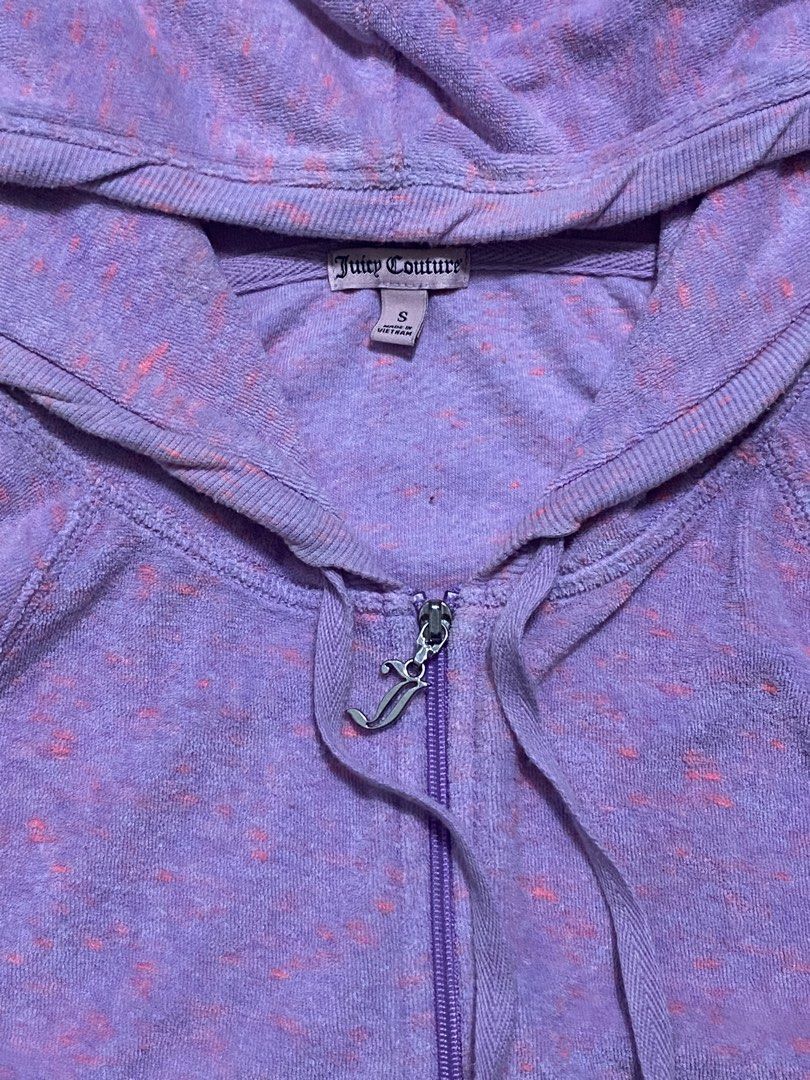 Juicy Couture Hoodie - Size S (Category: Coats, Jackets and Outerwear) located in Pasay City. Submitted by 4zalea (Listing ID 1434758103, Image 2). Description: - Juicy Couture hoodie - Size: S - Full zip closure - Hood with drawstrings - Purple and pink speckled design - Juicy Couture logo on the back - Two front pockets.