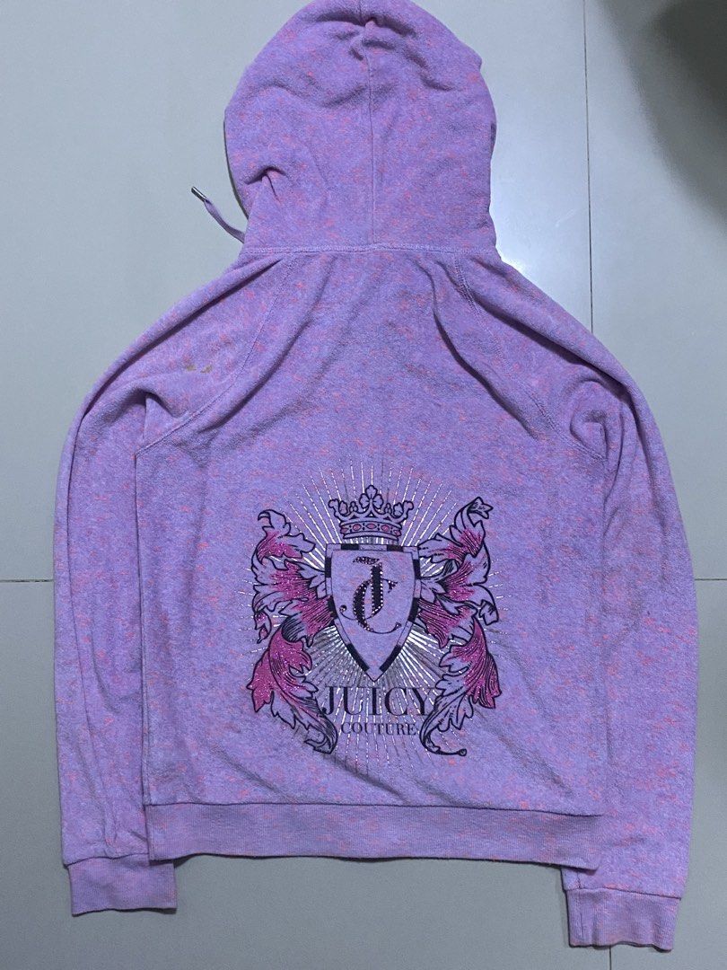 Juicy Couture Hoodie - Size S (Category: Coats, Jackets and Outerwear) located in Pasay City. Submitted by 4zalea (Listing ID 1434758103, Image 3). Description: - Juicy Couture hoodie - Size: S - Full zip closure - Hood with drawstrings - Purple and pink speckled design - Juicy Couture logo on the back - Two front pockets.