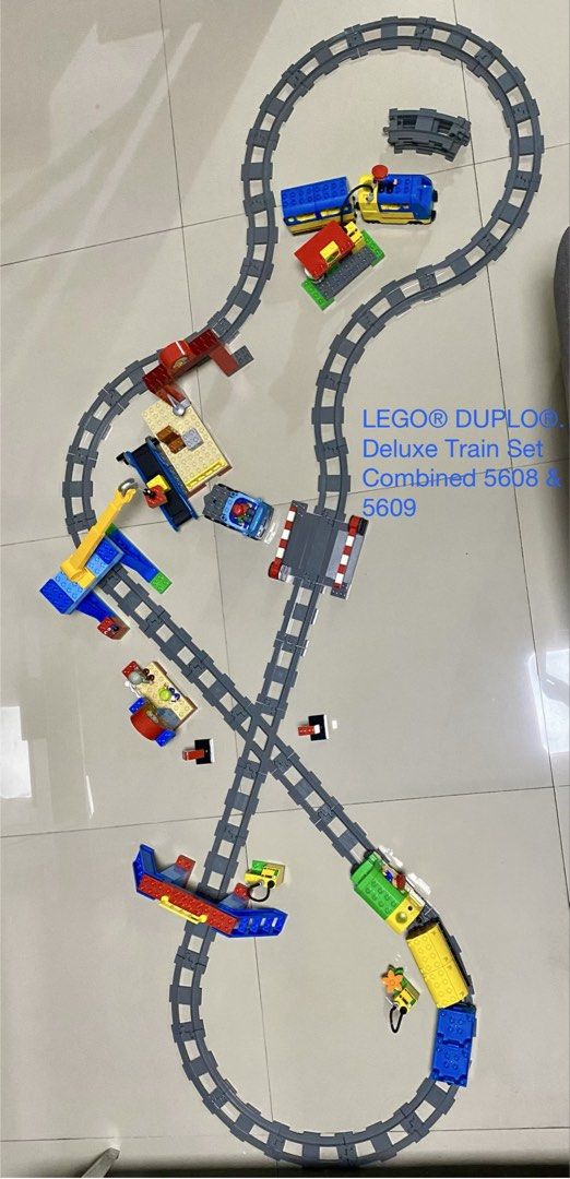 LEGO Duplo Train Set 5608, 5609 and Other sets (Category: Lego & Building Sets) located in Quezon City. Submitted by randy__c (Listing ID 1434784865, Image 1). Description: For Sale : Original Lego Duplo Deluxe Train Set (Motorized Battery Operates) 5608, 5609 & Duplo Set 2997, 10561, 10576, 10522, 10543, 5603, 5645, 4979 & extra 101 pcs broken duplo with two 8x12 base plate and building plate. One Train Working and The Other may just need WD Spr