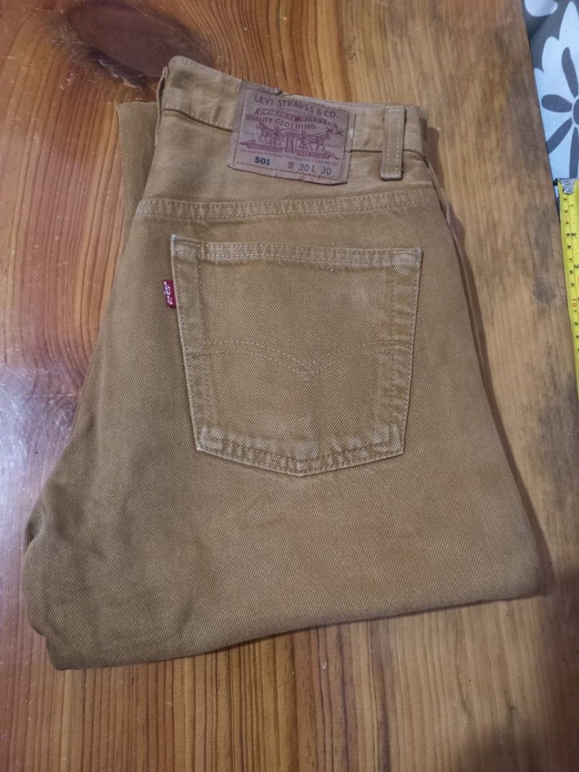 Levi's 501 W30 L30 Jeans (Category: Jeans) located in Baguio. Submitted by highticket75 (Listing ID 1434695948, Image 1). Description: - Levi's 501 jeans - Caramel color - Button code: 553 - Straight leg fit - Waist: W30, Length: L30 - Best fit S29 waist - Missing washtag - Features the iconic red Levi's tag.