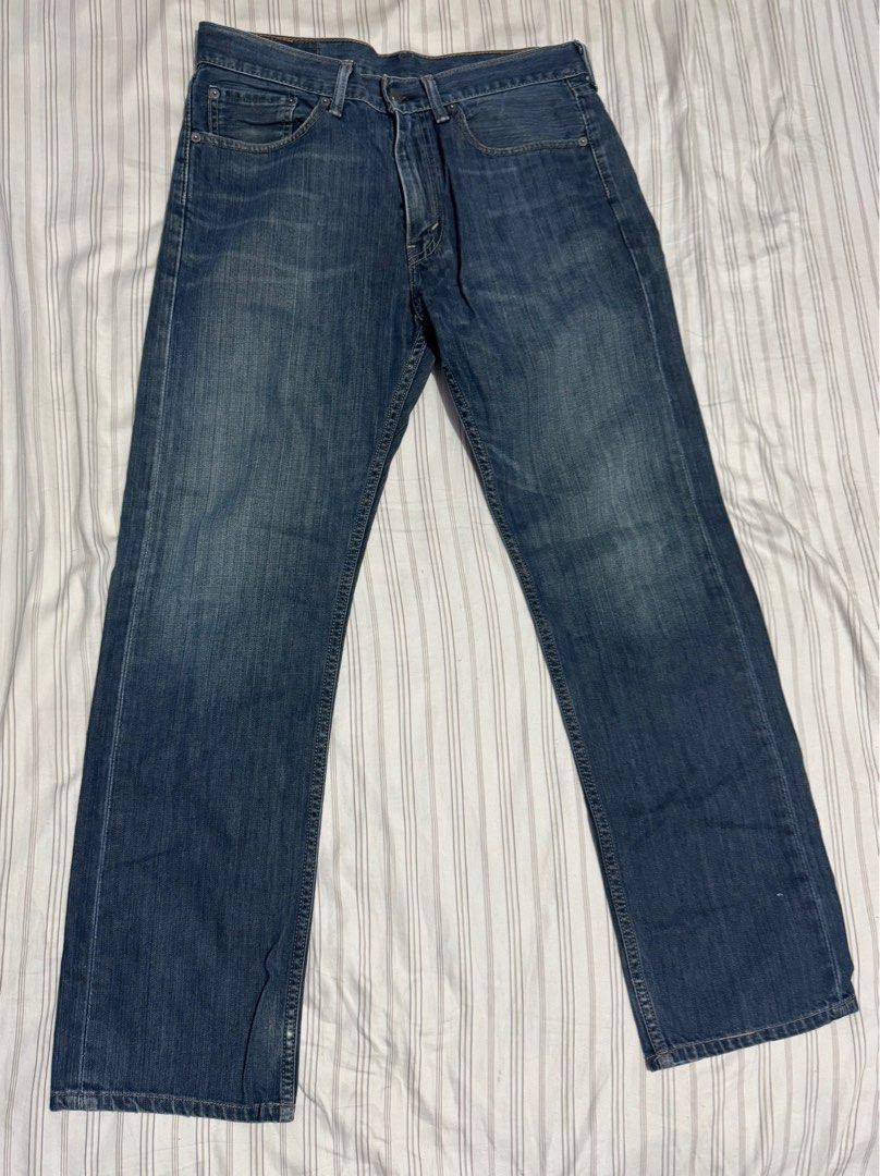 Levi's 505 Jeans - W32 L32 (Category: Jeans) located in Marikina City. Submitted by roystmichael.cloud (Listing ID 1434682464, Image 3). Description: - Authentic Levi's 505 jeans - Classic blue wash - Straight leg fit - Size: W32 L32 - Button and zipper closure - Made in Mexico - Features Levi's red tab - Levi Strauss & Co. logo on back pocket.