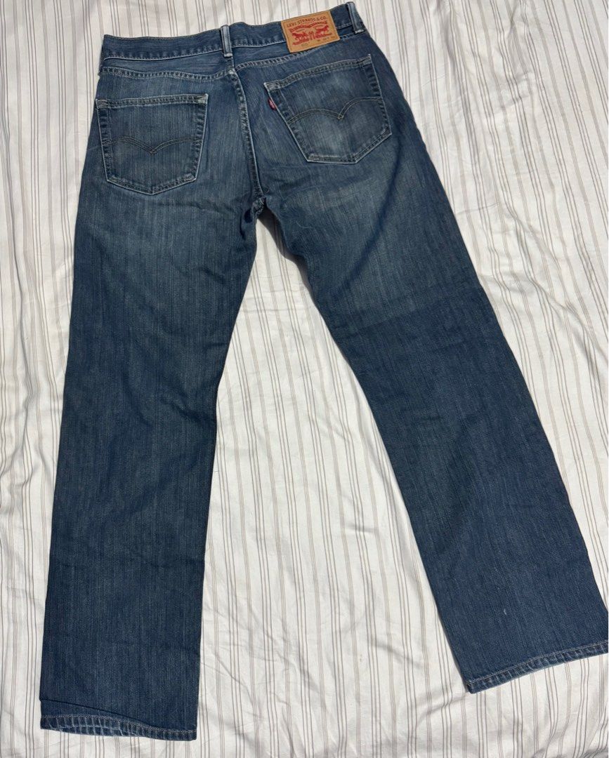 Levi's 505 Jeans - W32 L32 (Category: Jeans) located in Marikina City. Submitted by roystmichael.cloud (Listing ID 1434682464, Image 2). Description: - Authentic Levi's 505 jeans - Classic blue wash - Straight leg fit - Size: W32 L32 - Button and zipper closure - Made in Mexico - Features Levi's red tab - Levi Strauss & Co. logo on back pocket.