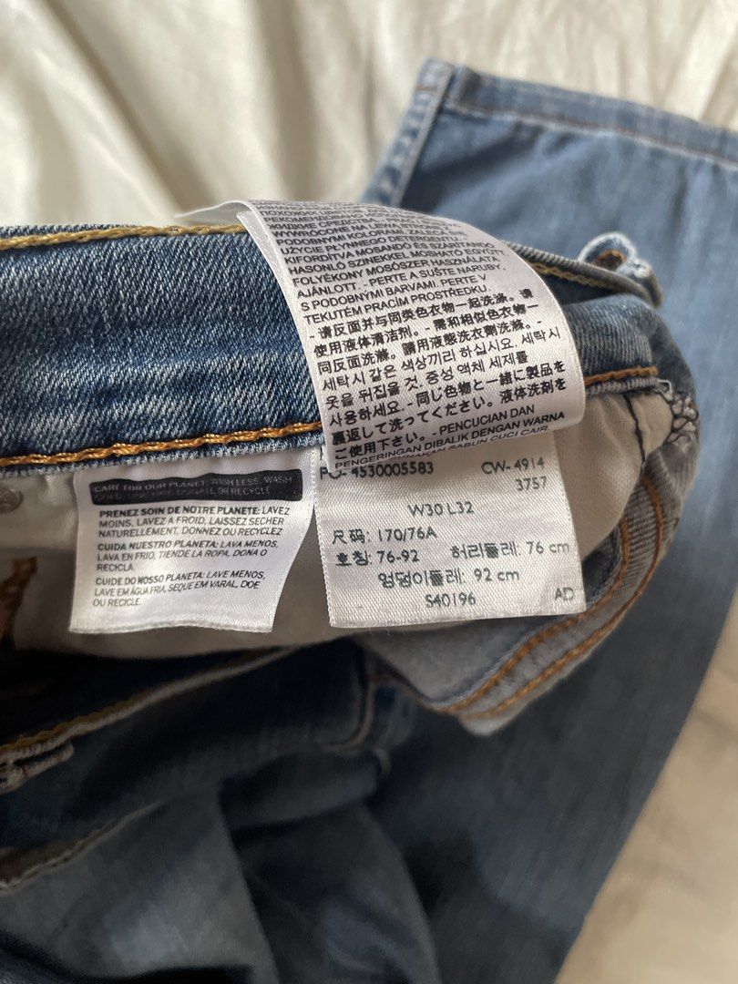 Levi's 510 Jeans - W30 L32 (Category: Jeans) located in Magalang. Submitted by camsss. (Listing ID 1434700776, Image 3). Description: - Levi's 510 jeans - Light blue wash - Size: W30 L32 - Straight leg fit - Button fly - Classic five-pocket design - Levi's red tab on back pocket - Made from denim.