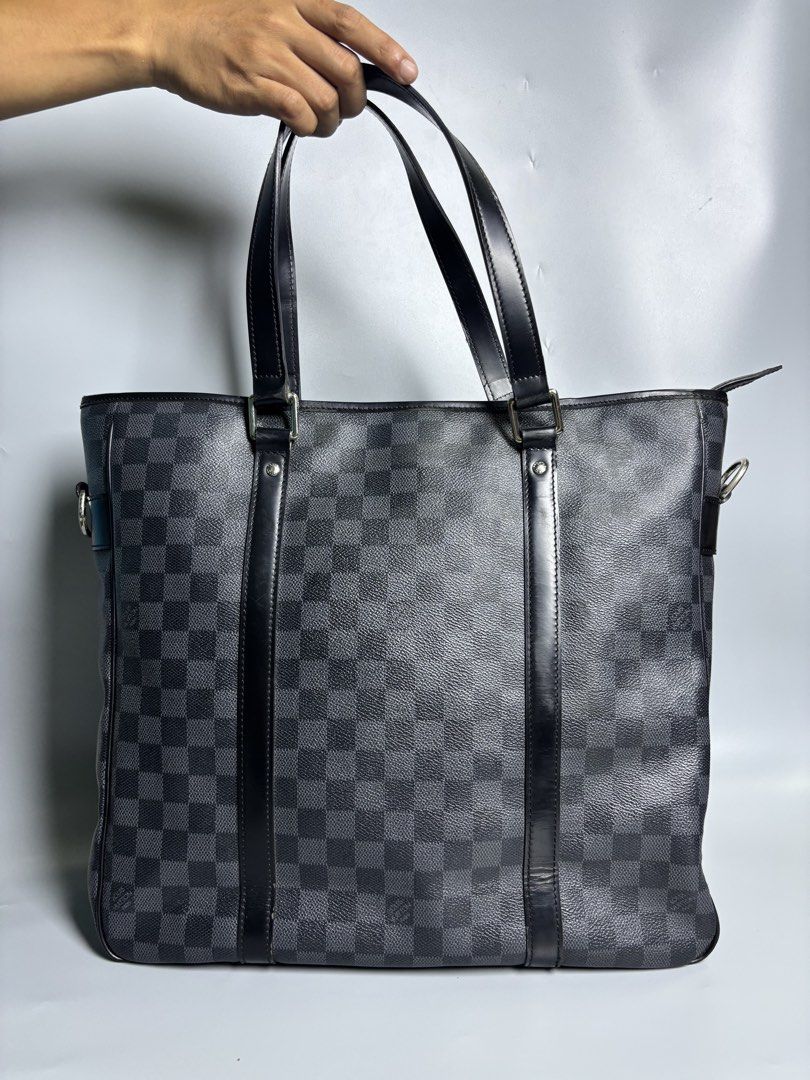 Louis Vuitton Damier Graphite Tote Bag (Category: Luxury Bags & Wallets) located in Manila. Submitted by manisanro47672 (Listing ID 1434806006, Image 2). Description: - Authentic Louis Vuitton Damier Graphite Tote Bag - Classic checkered design - Spacious interior - Dual top handles and detachable shoulder strap - Secure zip closure - Silver-tone hardware - Suitable for casual and business use.