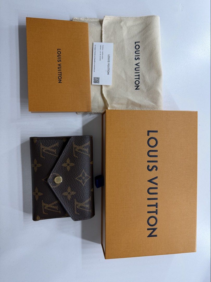 Louis Vuitton Victorine Wallet (Category: Luxury Bags & Wallets) located in Cebu City. Submitted by honeybontilao (Listing ID 1434781160, Image 1). Description: - Authentic Louis Vuitton Victorine Wallet - Brown monogram pattern - Includes original box, dust bag, and paperwork - Good as new, no tear/cracks - Personal preloved item, bought at Nustar for 32,900 - Slightly negotiable .