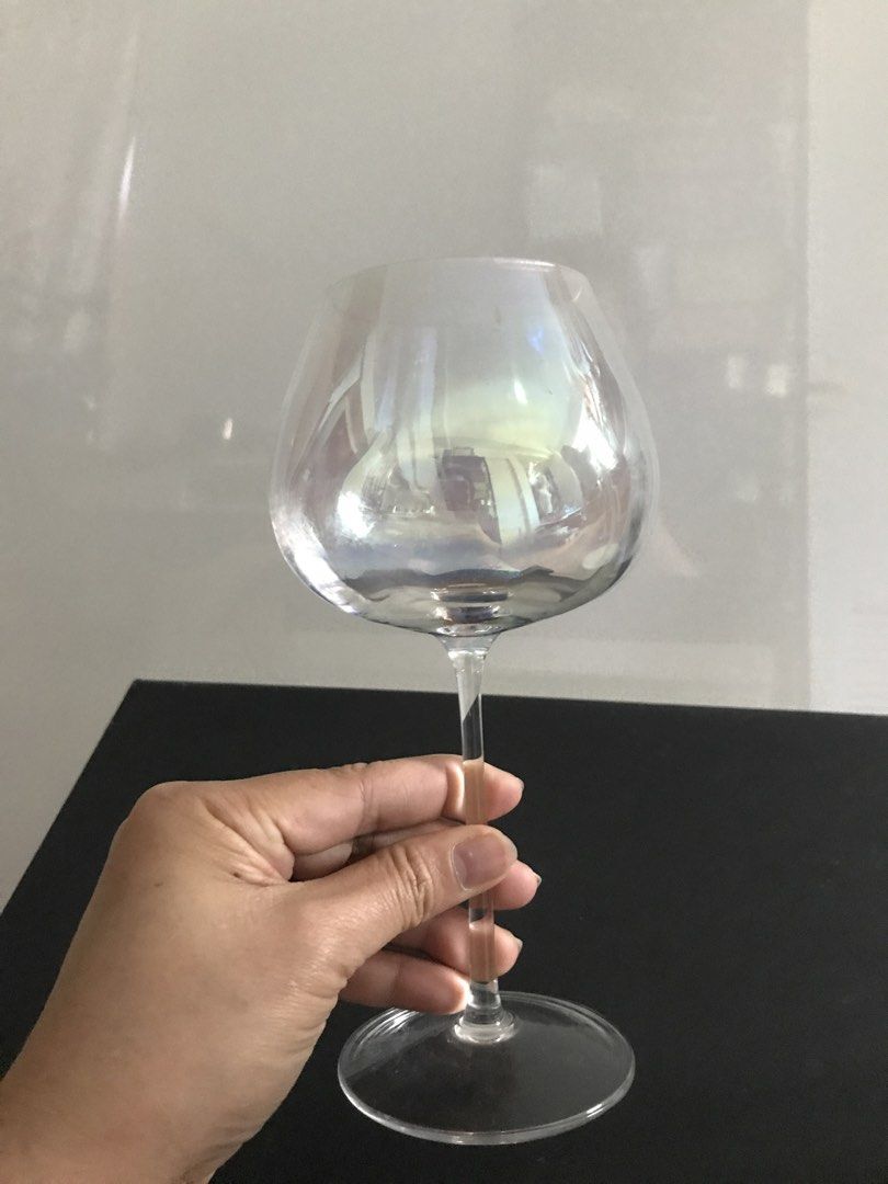 LSA Iridescent Wine Glass (Category: Dinnerware & Cutlery) located in Quezon City. Submitted by draxxfinds (Listing ID 1434701537, Image 2). Description: - Iridescent finish wine glass - Features a rounded bowl and slender stem - Clear, smooth surface - Wide base for stability - Comfortable grip - Ideal for wine and other beverages - Stylish addition to your home bar.