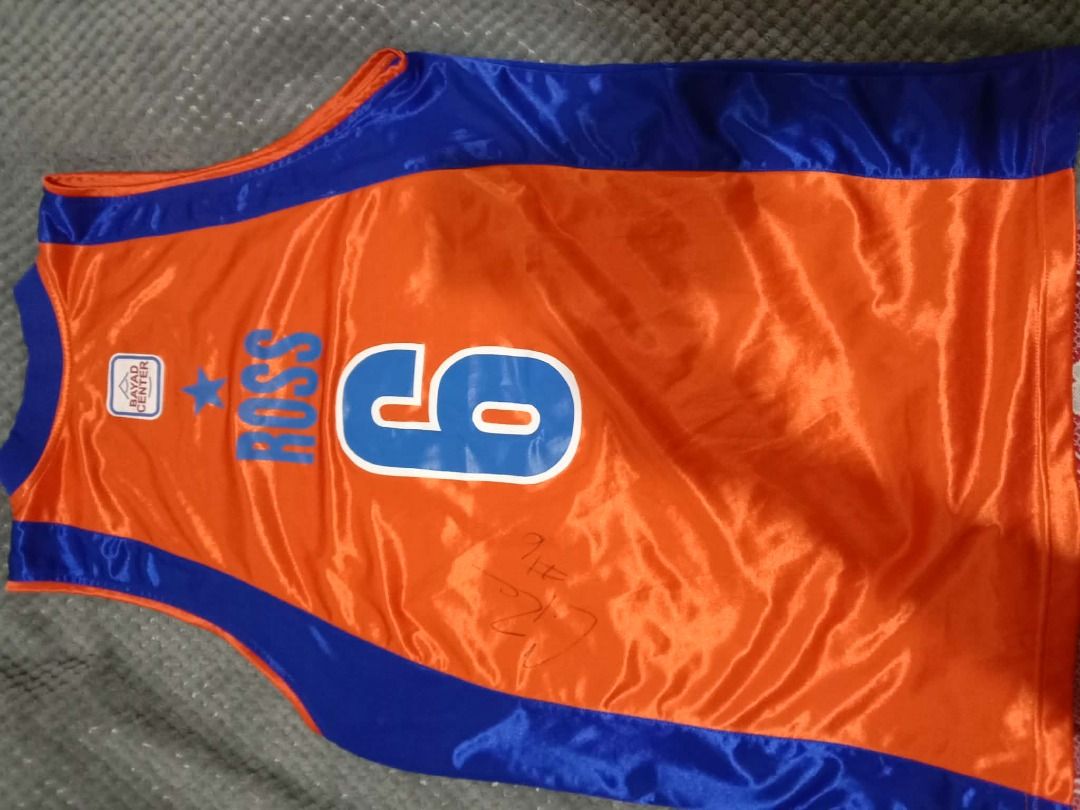 Meralco Bolts Jersey #6 (Category: Activewear) located in Cebu City. Submitted by bravetree.3f281d (Listing ID 1434749323, Image 2). Description: - Meralco Bolts basketball jersey - Number 6 on front and back - Name "ROSS" on the back - Includes team and sponsor logos - Made of a shiny material.