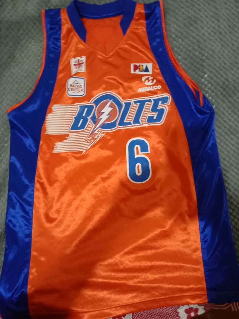 Meralco Bolts Jersey #6 (Category: Activewear) located in Cebu City. Submitted by bravetree.3f281d (Listing ID 1434749323, Image 1). Description: - Meralco Bolts basketball jersey - Number 6 on front and back - Name "ROSS" on the back - Includes team and sponsor logos - Made of a shiny material.