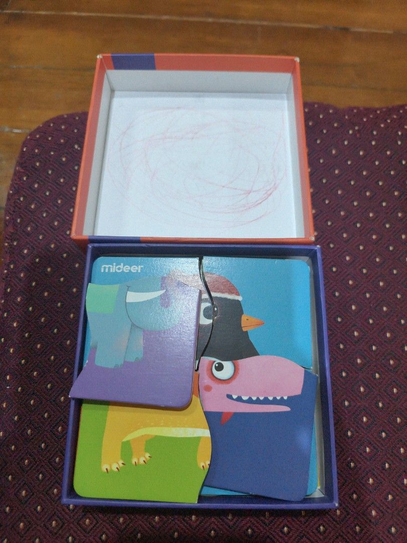 Mideer wooden animal puzzles (Category: Educational & Learning Toys) located in Borongan. Submitted by khakiskye (Listing ID 1434659001, Image 3). Description: scribbles on inner part of box. otherwise good as new..