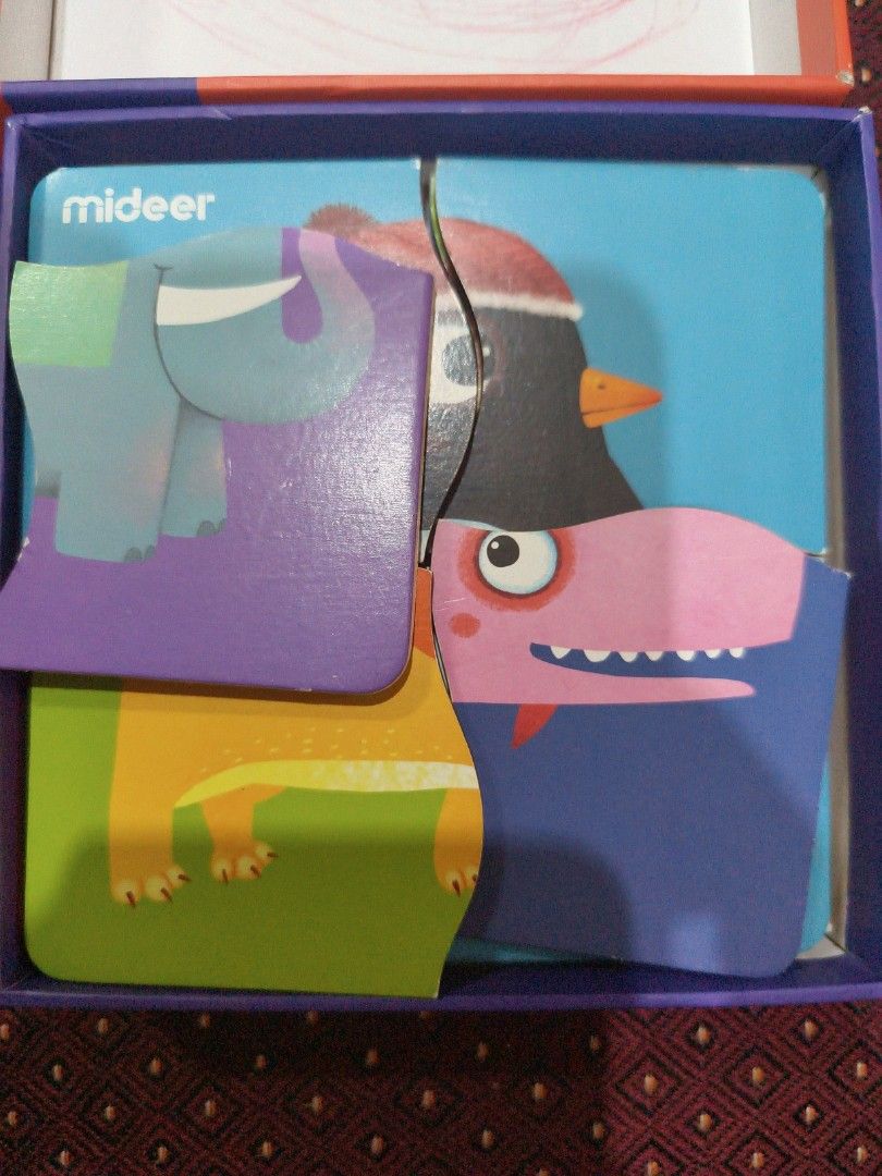 Mideer wooden animal puzzles (Category: Educational & Learning Toys) located in Borongan. Submitted by khakiskye (Listing ID 1434659001, Image 2). Description: scribbles on inner part of box. otherwise good as new..