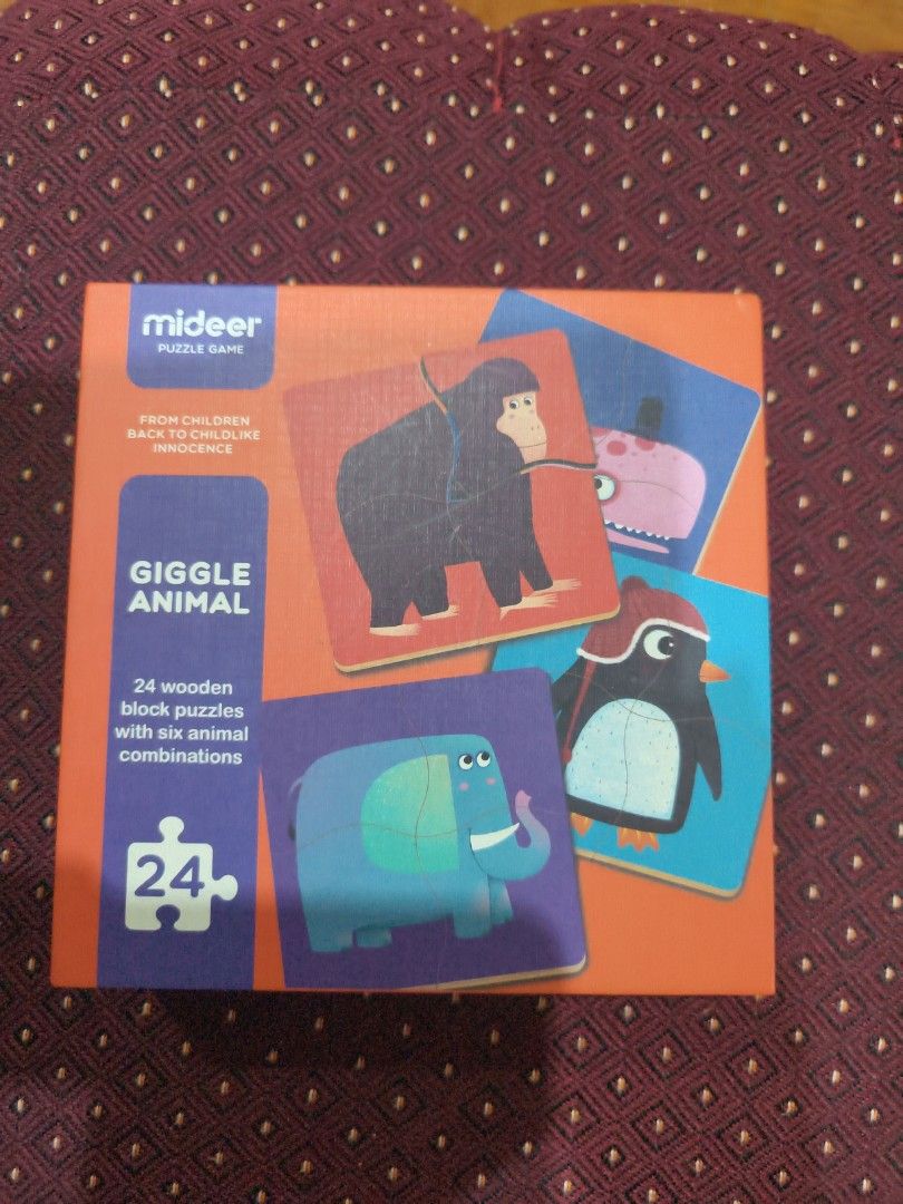 Mideer wooden animal puzzles (Category: Educational & Learning Toys) located in Borongan. Submitted by khakiskye (Listing ID 1434659001, Image 1). Description: scribbles on inner part of box. otherwise good as new..