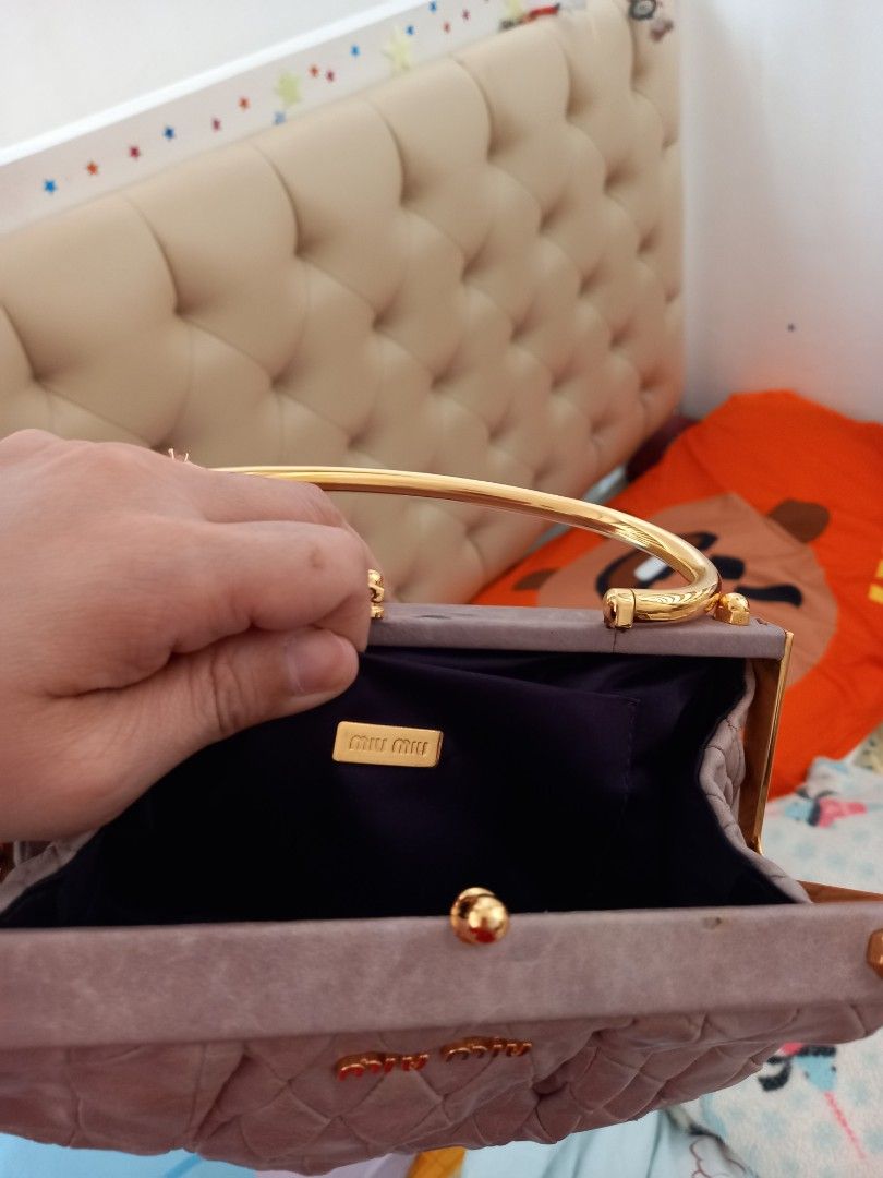 MIU MIU (Category: Luxury Bags & Wallets) located in Aurora. Submitted by pennyclover (Listing ID 1434802648, Image 3). Description: maganda po, super gold lahat ng handle, me code made in turkey, mat kaynting stains sa harap pero hndi naman gaano halata,super maganda po.