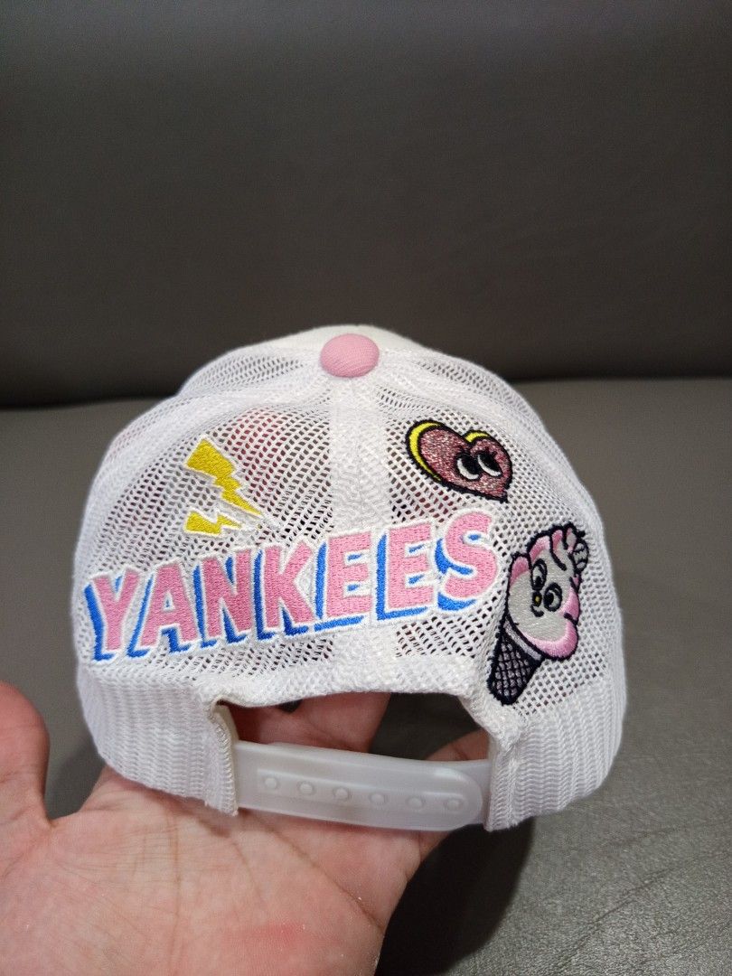 MLB New York Yankees Pink Cap (Category: Caps & Hats) located in Davao. Submitted by vaness041421 (Listing ID 1434804638, Image 3). Description: - New York Yankees cap - Pink logo on white front panel - Pink brim - Mesh back with "Yankees" detail - Adjustable strap - MLB logo on the side.