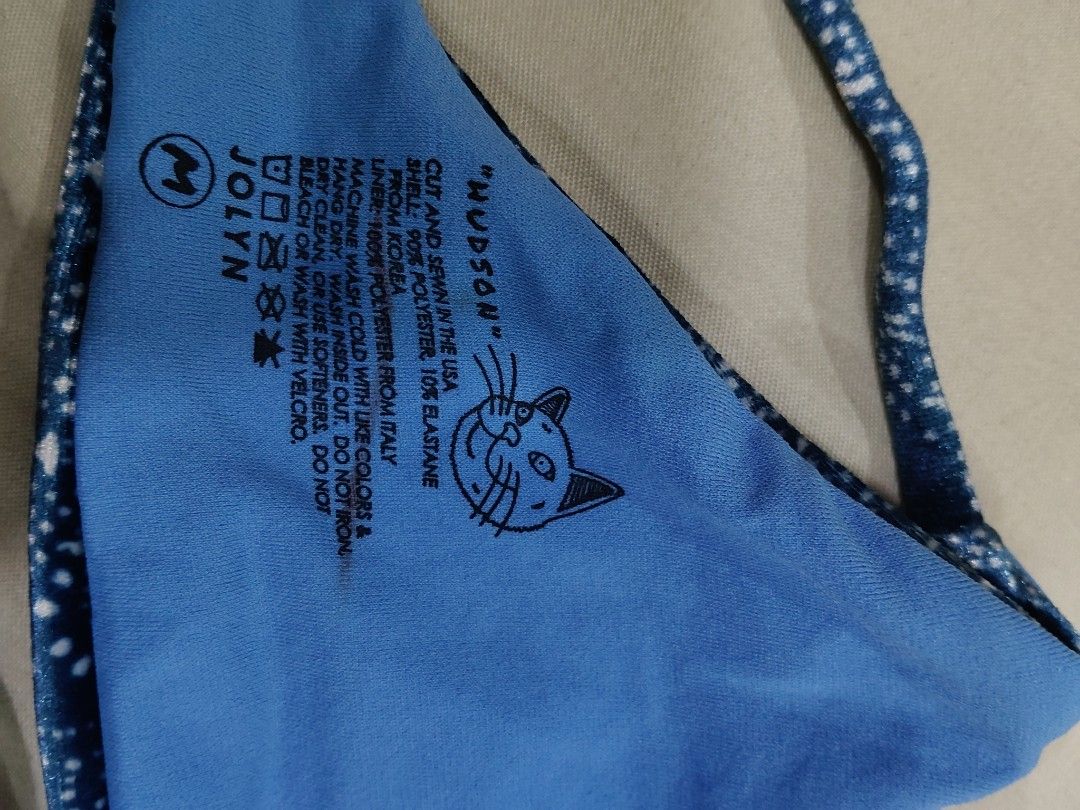 Jolyn Natori Hudson Bikini Top (Category: Bikinis & Swimsuits) located in Manila. Submitted by ajrswimwear (Listing ID 1434755722, Image 3). Description: - Natori blue bikini top - Halter neck design - Tie closure at the back - Size: M - Fabric: 100% polyester, 10% elastane - Fabric origin: Italy - Lining origin: Korea - Made in USA - Machine wash cold - Do not bleach or wash with velcro.